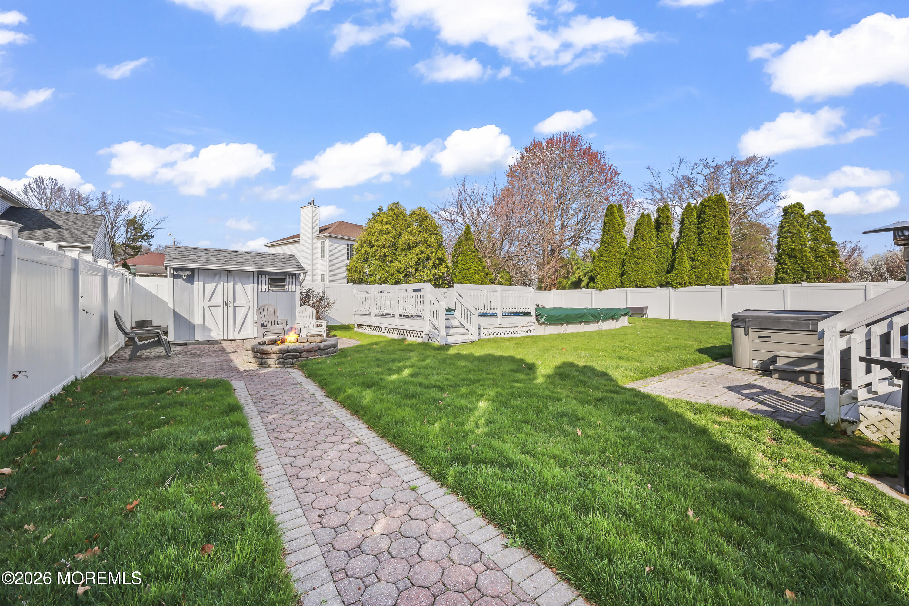 17 Sun Hollow Road Howell, NJ 07731 - Photo 39 of 43 a view of yard with swimming pool and green space