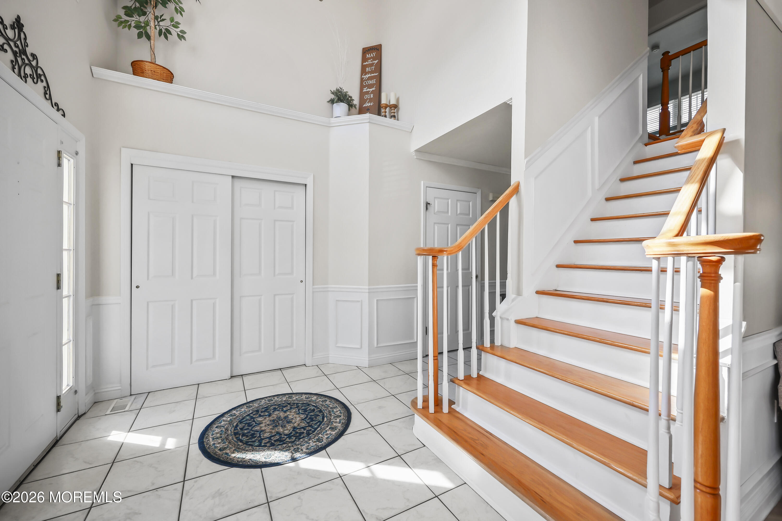 17 Sun Hollow Road Howell, NJ 07731 - Photo 4 of 43 a view of a livingroom with wooden floor and stairs