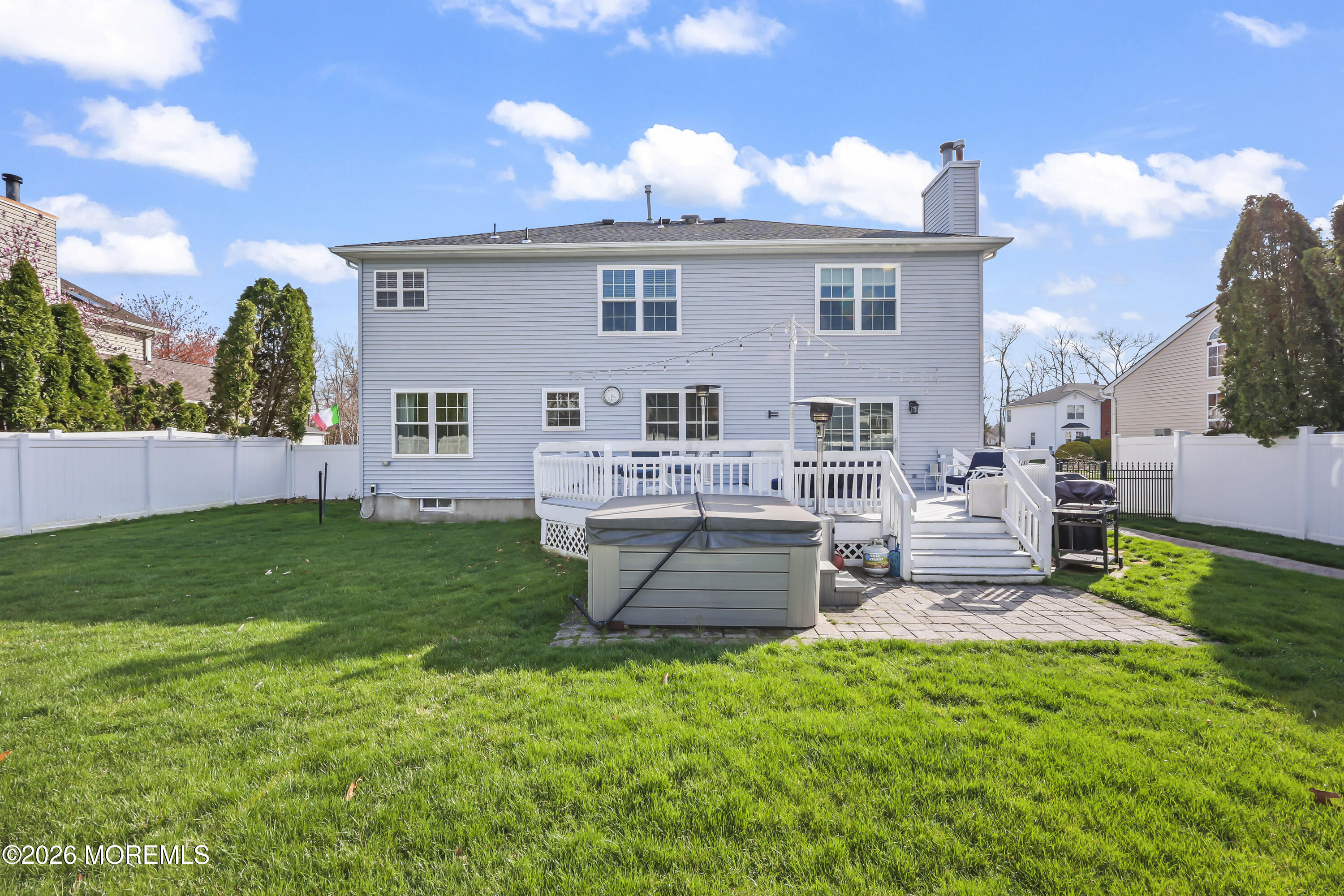 17 Sun Hollow Road Howell, NJ 07731 - Photo 42 of 43 a front view of house with yard and outdoor seating
