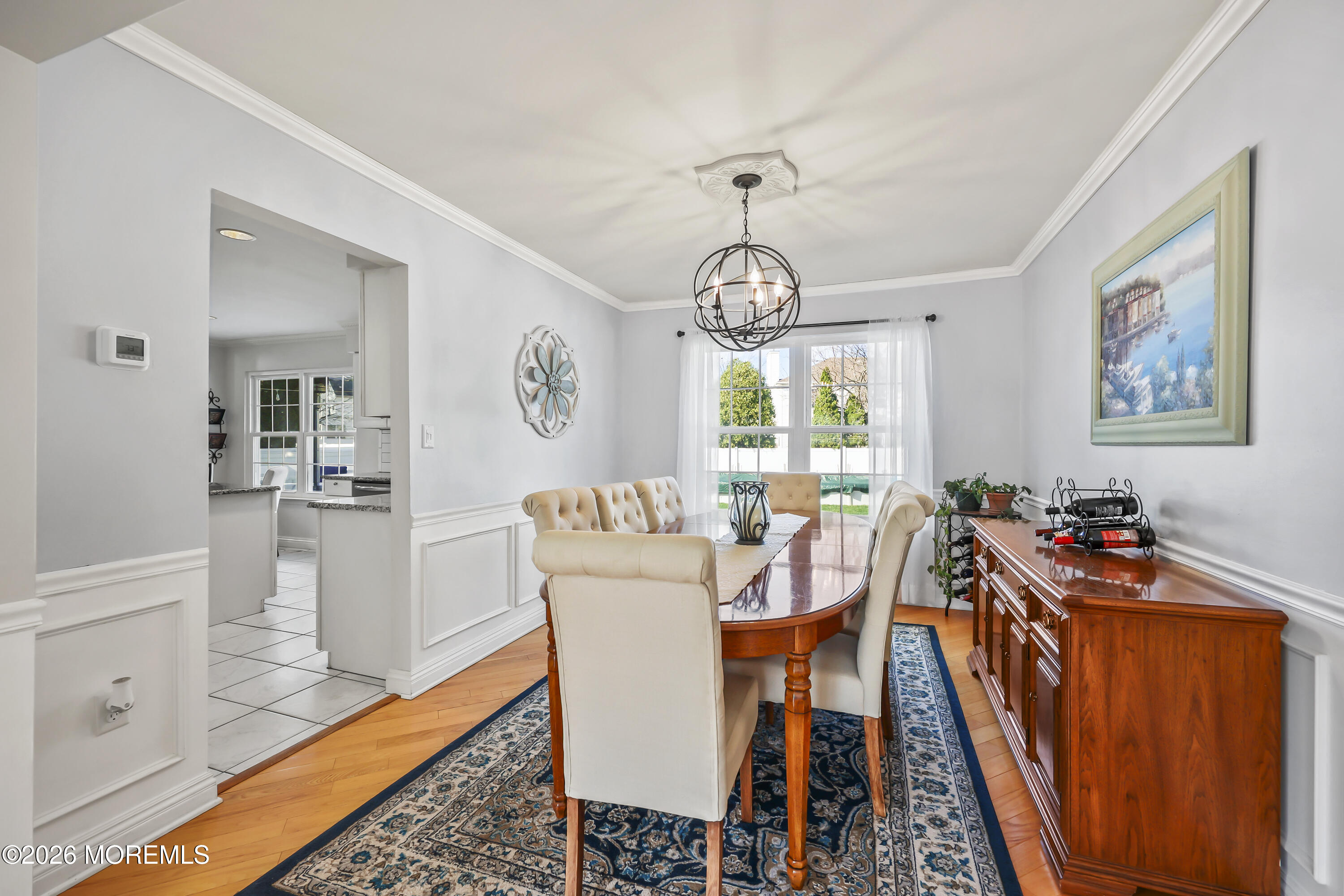 17 Sun Hollow Road Howell, NJ 07731 - Photo 8 of 43 a view of a dining room with furniture window and wooden floor