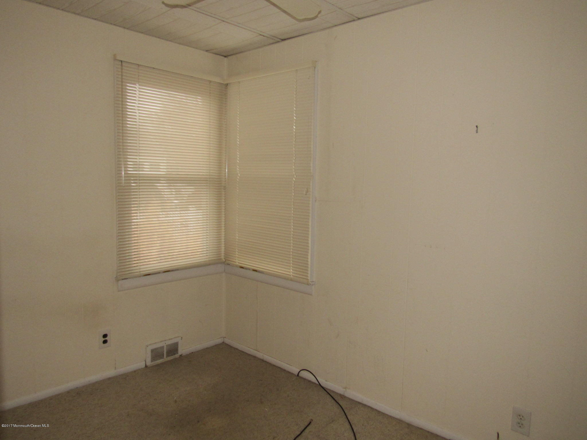 1136 Minnesink Road Manasquan, NJ 08736 - Photo 8 of 9 an empty room with a window