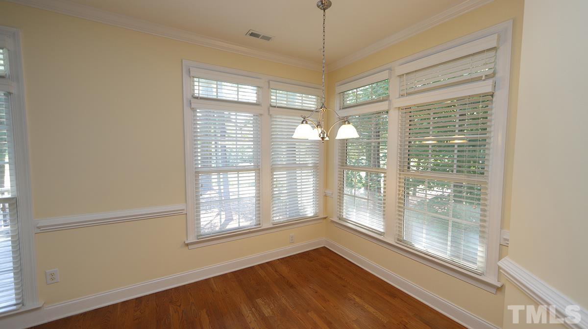 263 Waterville Street Raleigh, NC 27603 - Photo 7 of 18 a view of an empty room with a window