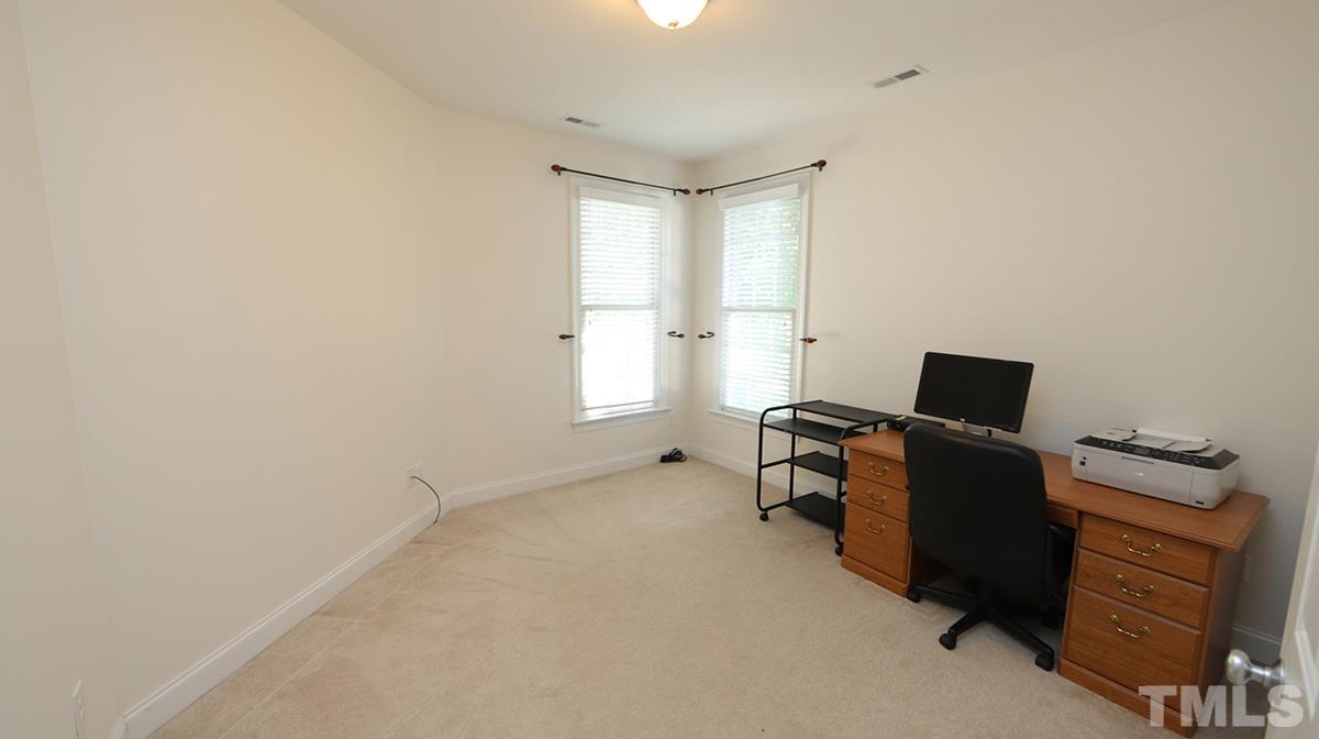263 Waterville Street Raleigh, NC 27603 - Photo 9 of 18 a workspace with furniture and window