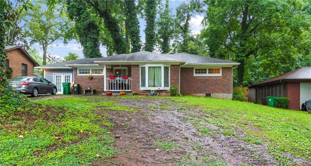 3003 Catalina Drive Decatur, GA 30032 - Photo 1 of 1 a view of an house that has garden