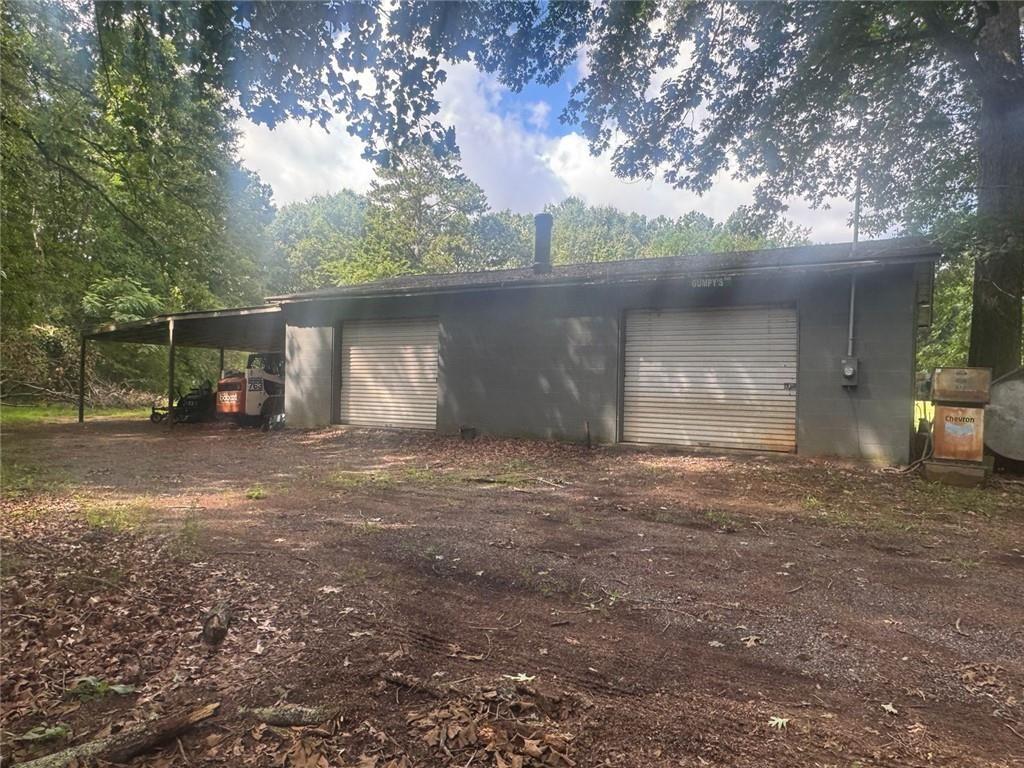 2550 Conyers Road McDonough, GA 30252 - Photo 11 of 29 a view of a house with a yard and tree