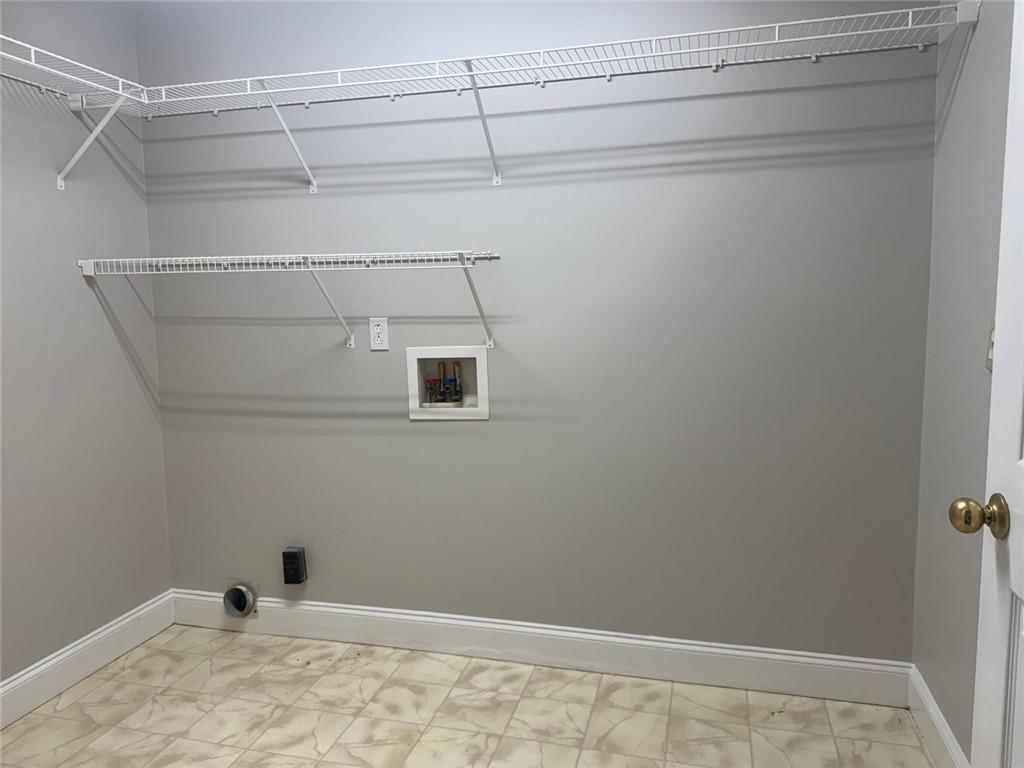 2550 Conyers Road McDonough, GA 30252 - Photo 22 of 29 a view of a room with racks on the wall