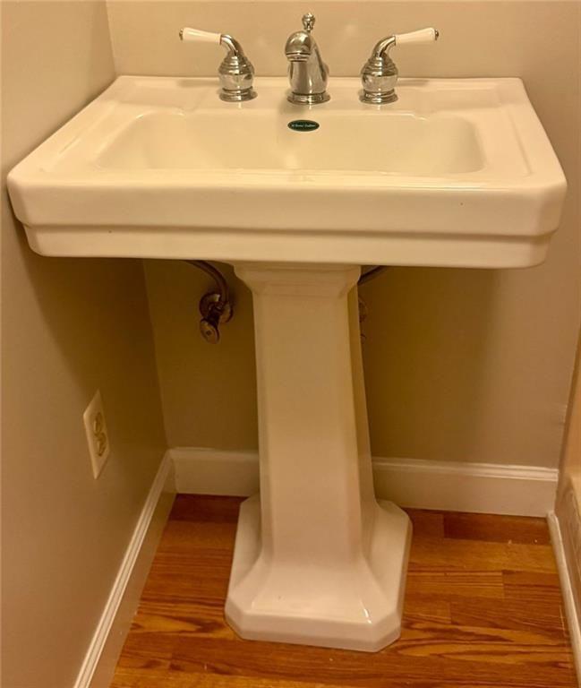 2550 Conyers Road McDonough, GA 30252 - Photo 23 of 29 a bathroom with a sink and a mirror