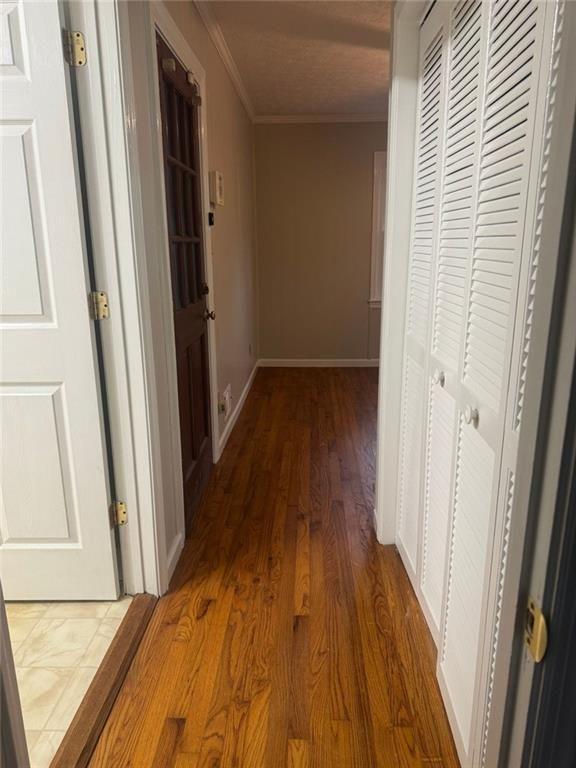 2550 Conyers Road McDonough, GA 30252 - Photo 24 of 29 a view of a hallway with wooden floor and staircase