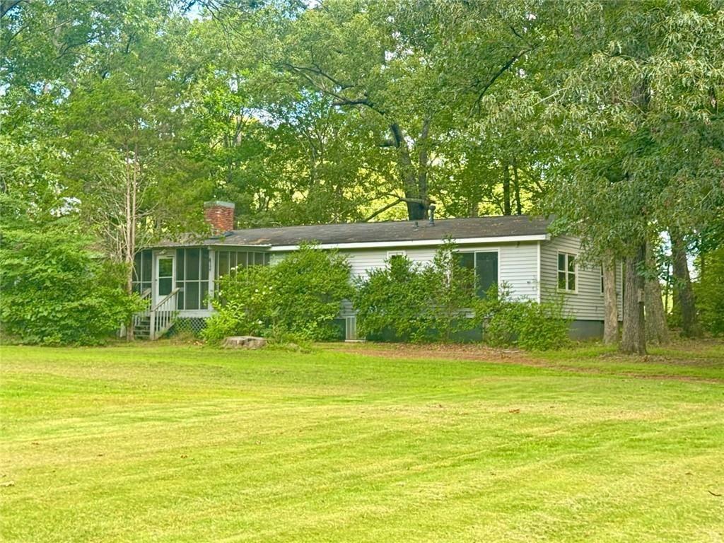 2550 Conyers Road McDonough, GA 30252 - Photo 3 of 29 a view of a house with a swimming pool
