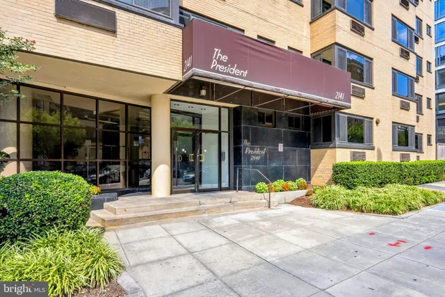 a view of a building with a garden