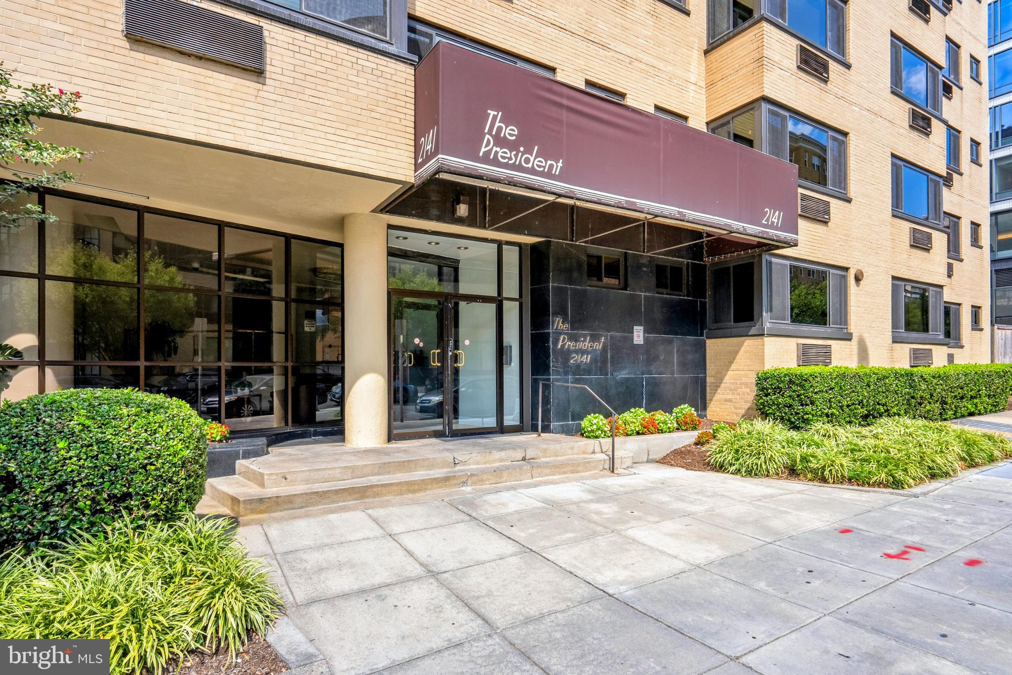 a view of a building with a garden