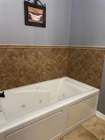 a bathroom with a bathtub