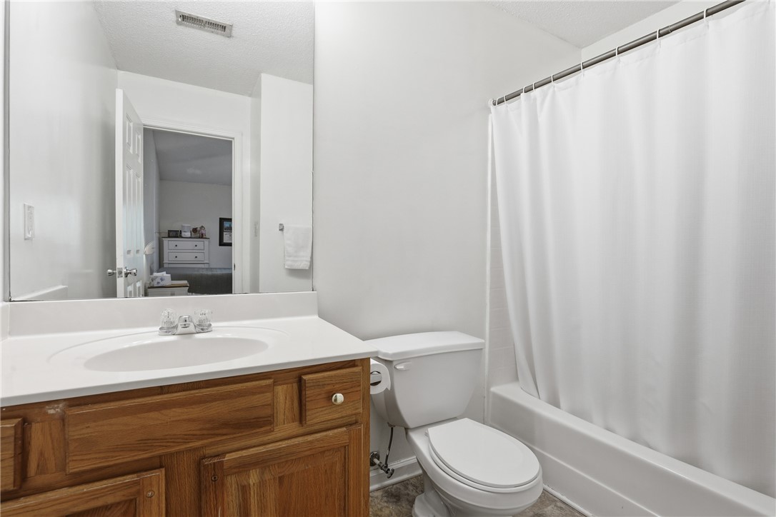 131 Wexford Drive Anderson, SC 29621 - Photo 18 of 25 This bright bathroom features a vanity with ample storage and a classic shower-tub combination.