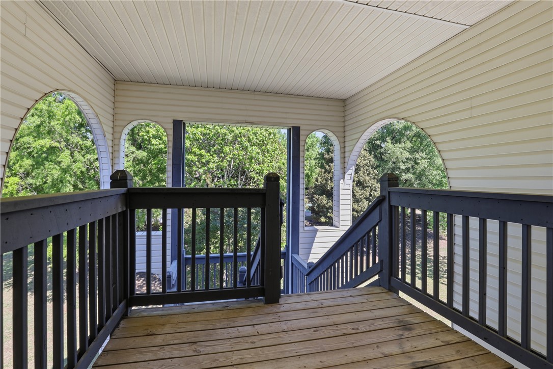 131 Wexford Drive Anderson, SC 29621 - Photo 21 of 25 This inviting outdoor space offers a private retreat with scenic views and classic architectural details.