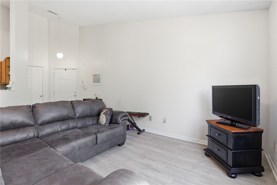 131 Wexford Drive Anderson, SC 29621 - Photo 7 of 25 This bright living area features soaring ceilings and durable flooring, perfect for comfortable living.