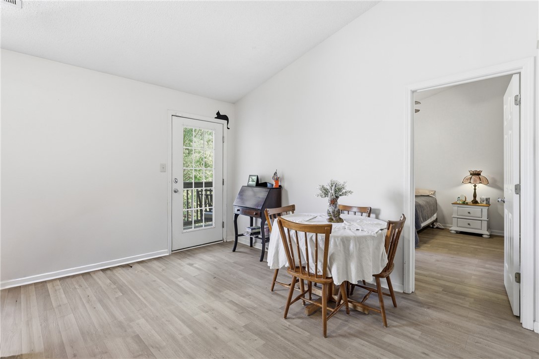 131 Wexford Drive Anderson, SC 29621 - Photo 8 of 25 Bright dining area with outdoor access and durable flooring.