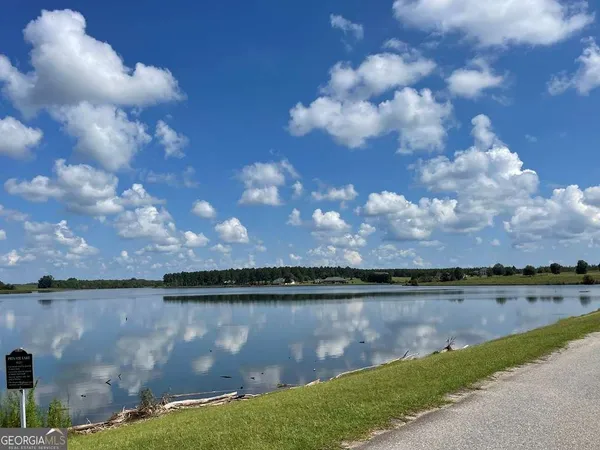a view of a lake from a yard