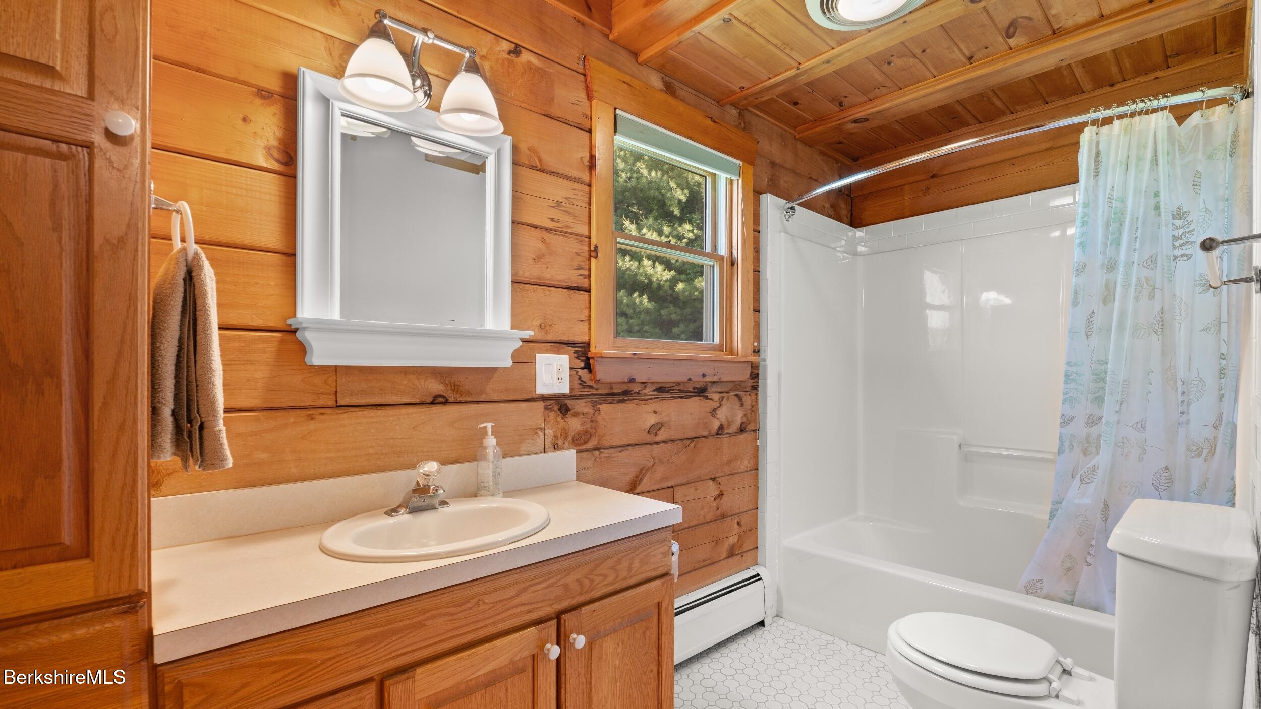 134 Hurlburt Road Great Barrington, MA 01230 - Photo 29 of 50 a bathroom with a sink toilet and shower