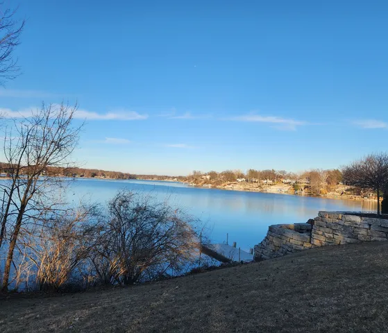 a view of a lake from a yard