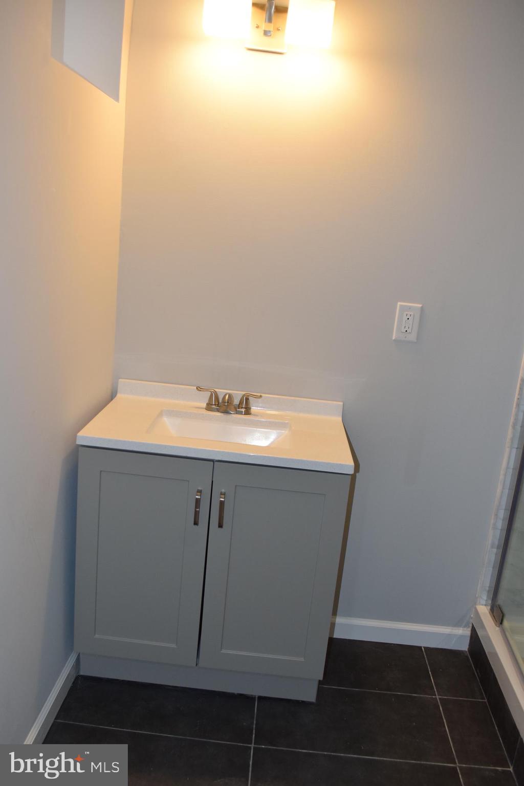 2214 Tasker Street Philadelphia, PA 19145 - Photo 32 of 33 Full Bathroom in basement