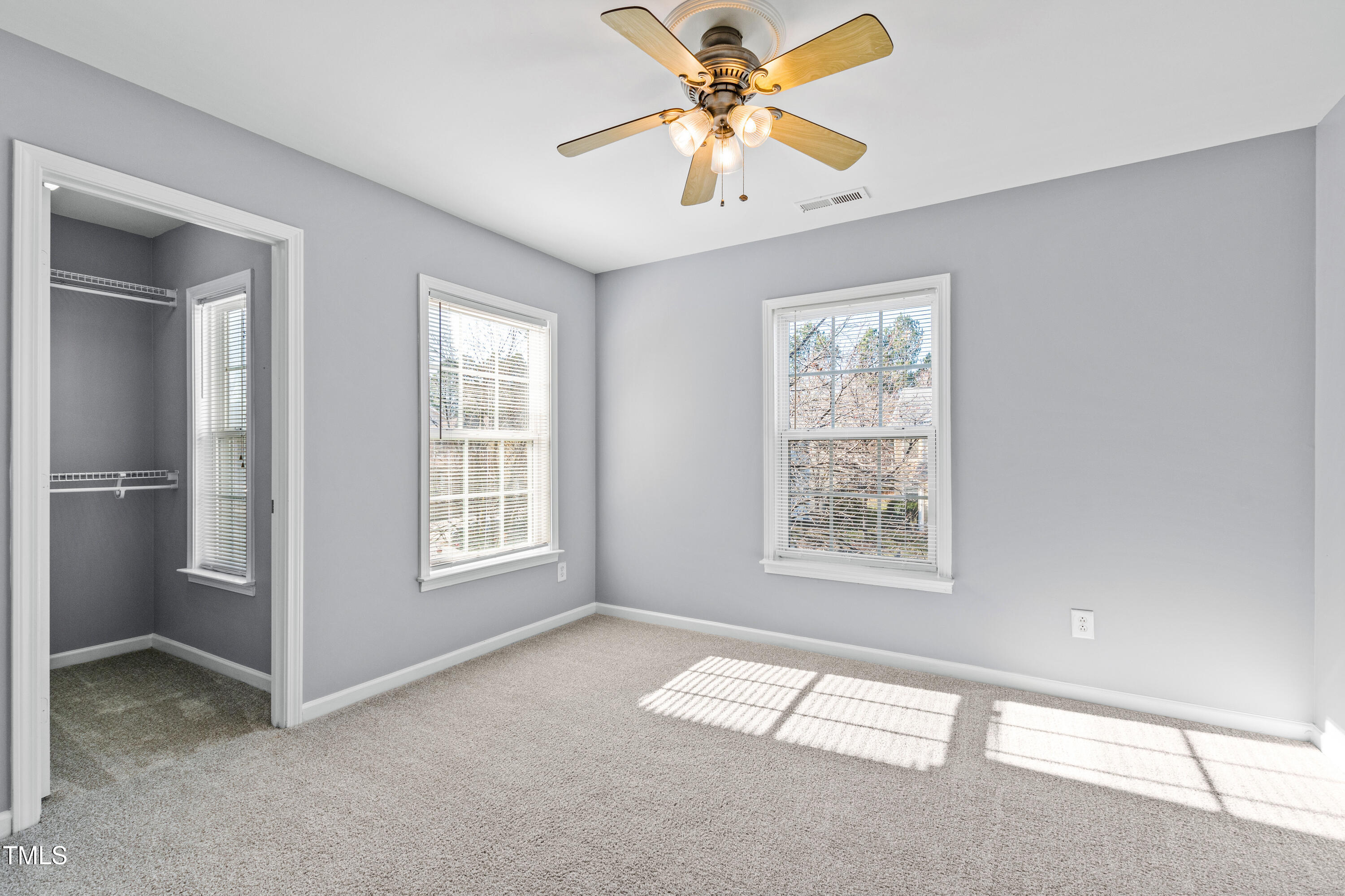 336 New Milford Road Cary, NC 27519 - Photo 36 of 53 a view of an empty room with a window