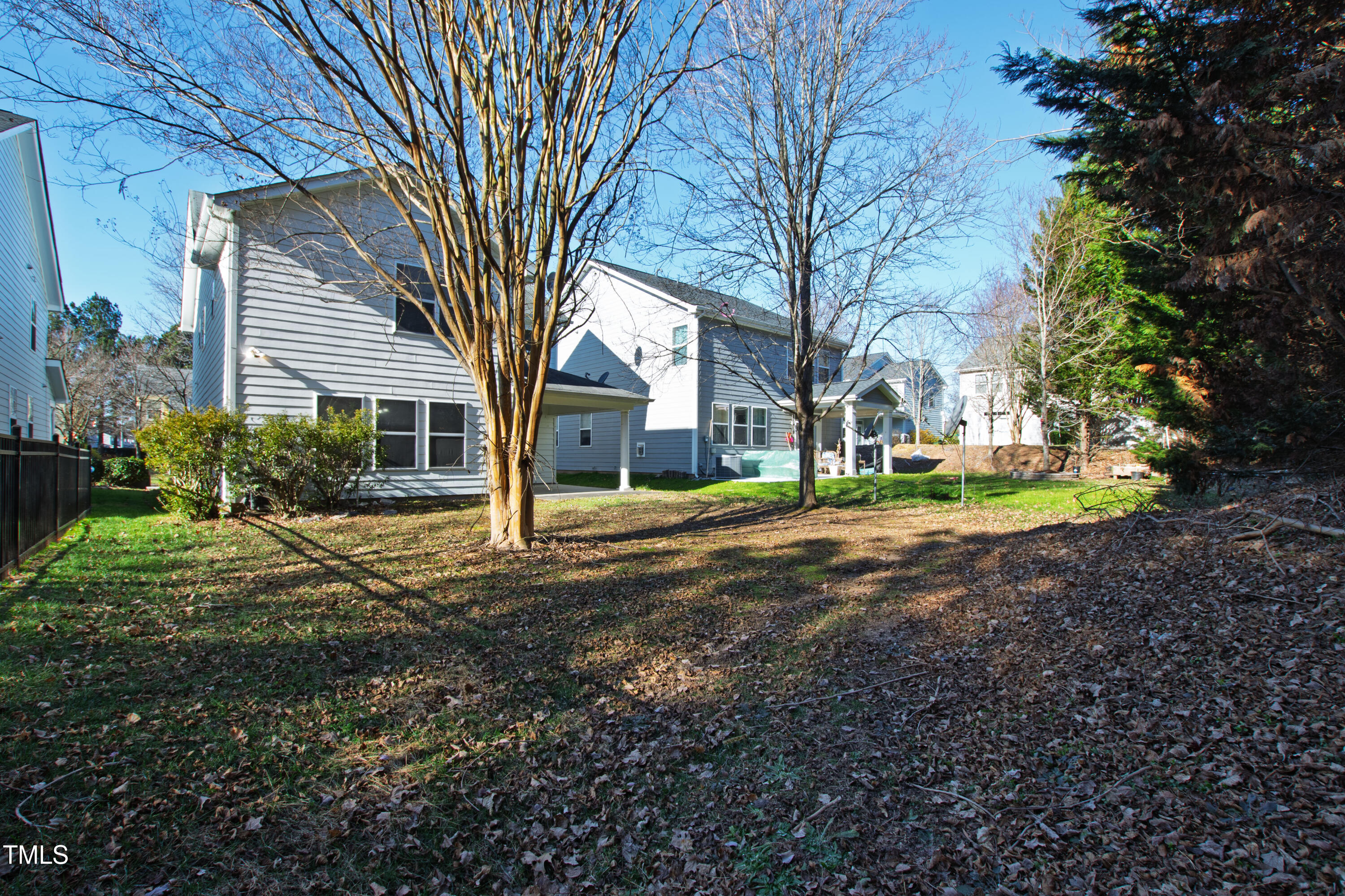 336 New Milford Road Cary, NC 27519 - Photo 46 of 53 a view of a house with backyard and tree
