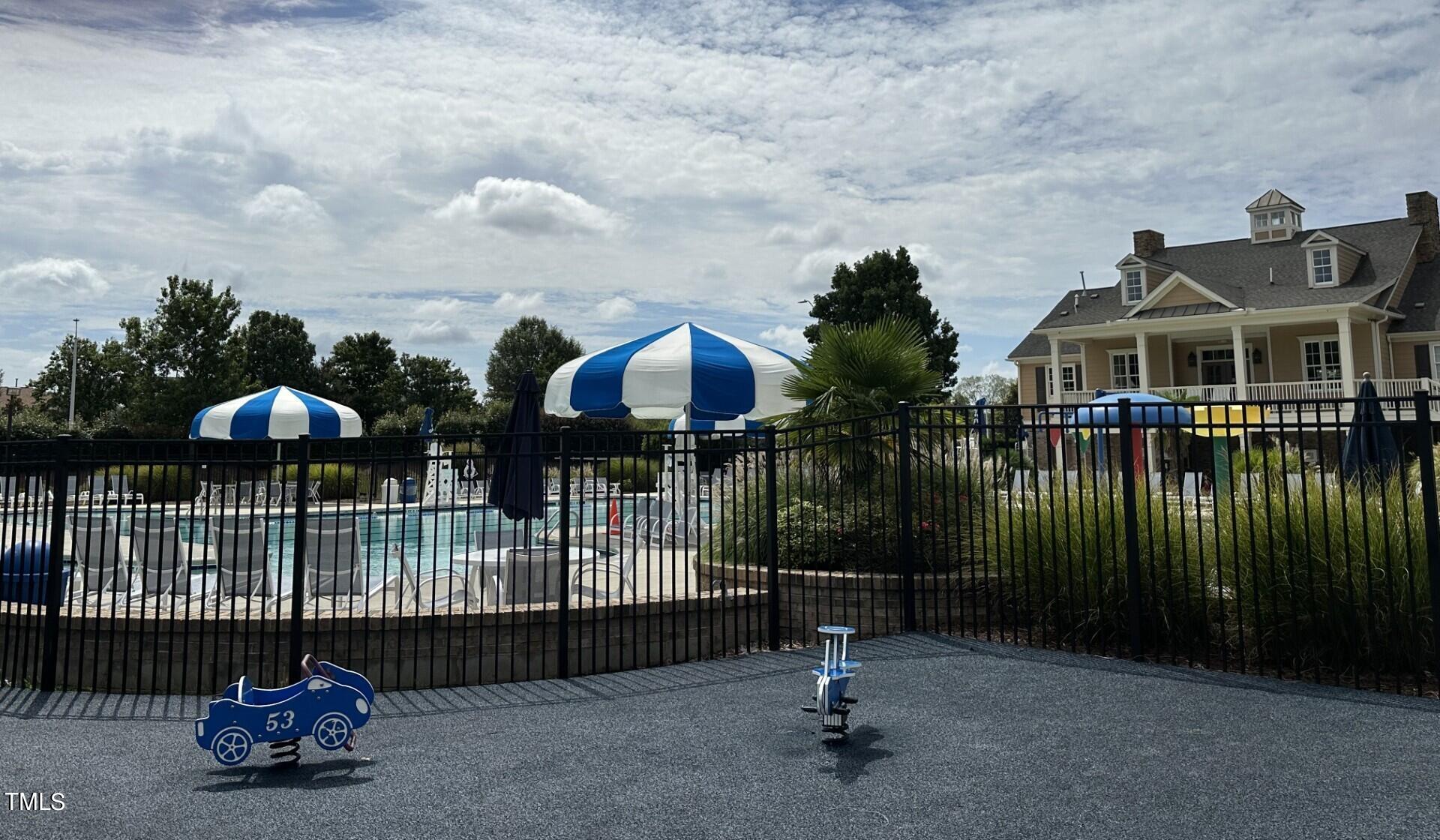 336 New Milford Road Cary, NC 27519 - Photo 48 of 53 a view of a house with a iron fence