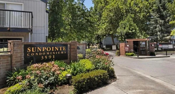 a view of a street with sitting area