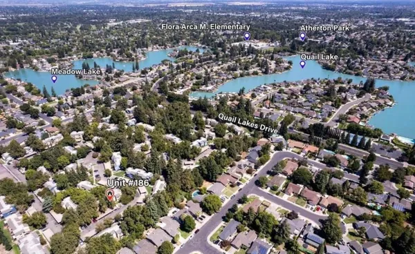 an aerial view of a city with lots of residential buildings