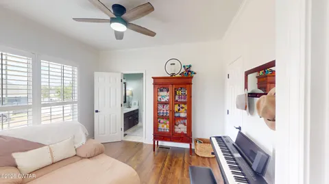 a bed room with a bed and a window