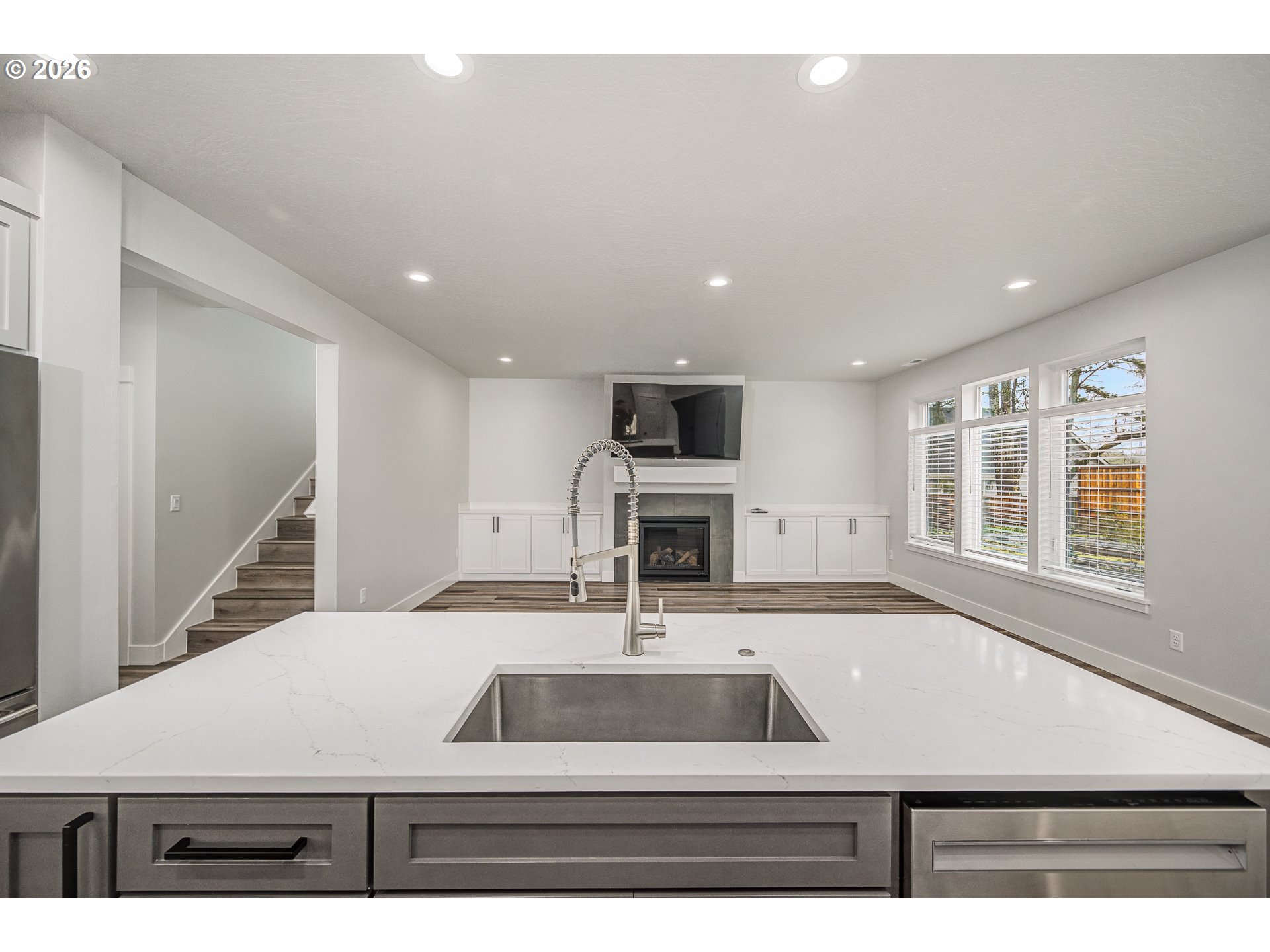 24678 Perkins Road, Unit LOT 26 Veneta, OR 97487 - Photo 11 of 48 a kitchen with a sink a microwave and cabinets