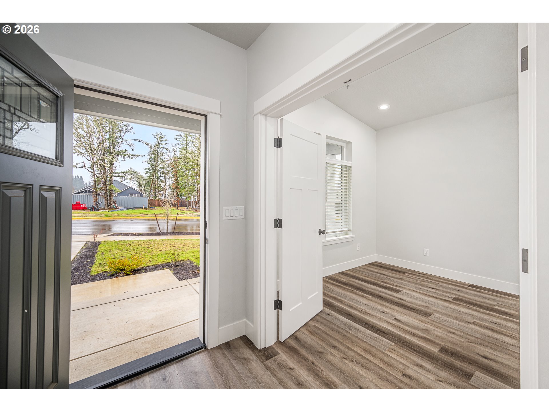 24678 Perkins Road, Unit LOT 26 Veneta, OR 97487 - Photo 2 of 48 a view of wooden floor and a living room