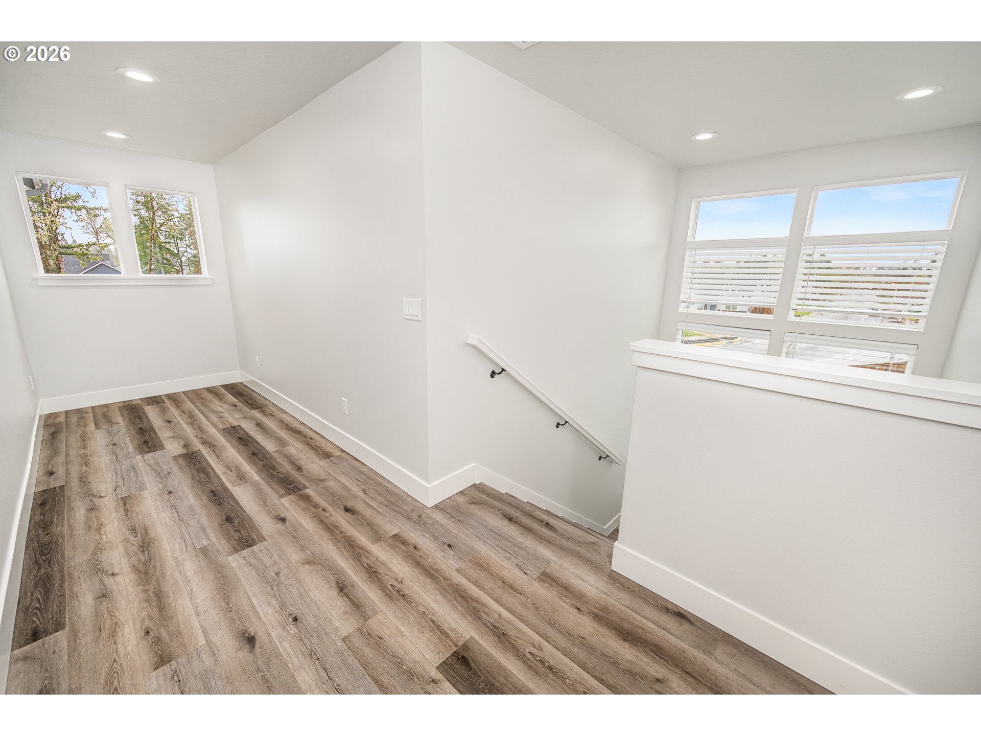 24678 Perkins Road, Unit LOT 26 Veneta, OR 97487 - Photo 23 of 48 a view of kitchen with wooden floor and electronic appliances