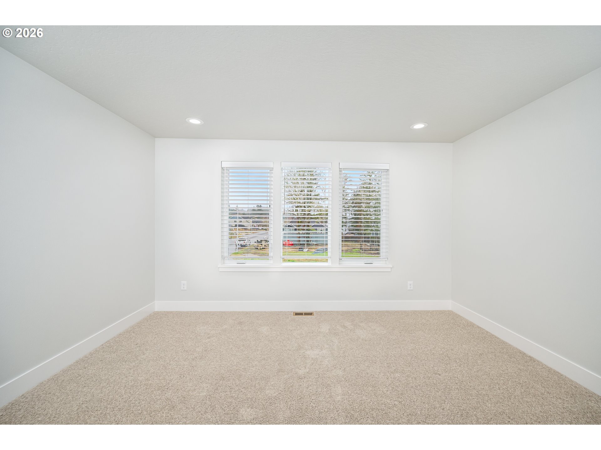 24678 Perkins Road, Unit LOT 26 Veneta, OR 97487 - Photo 31 of 48 a view of an empty room with a window