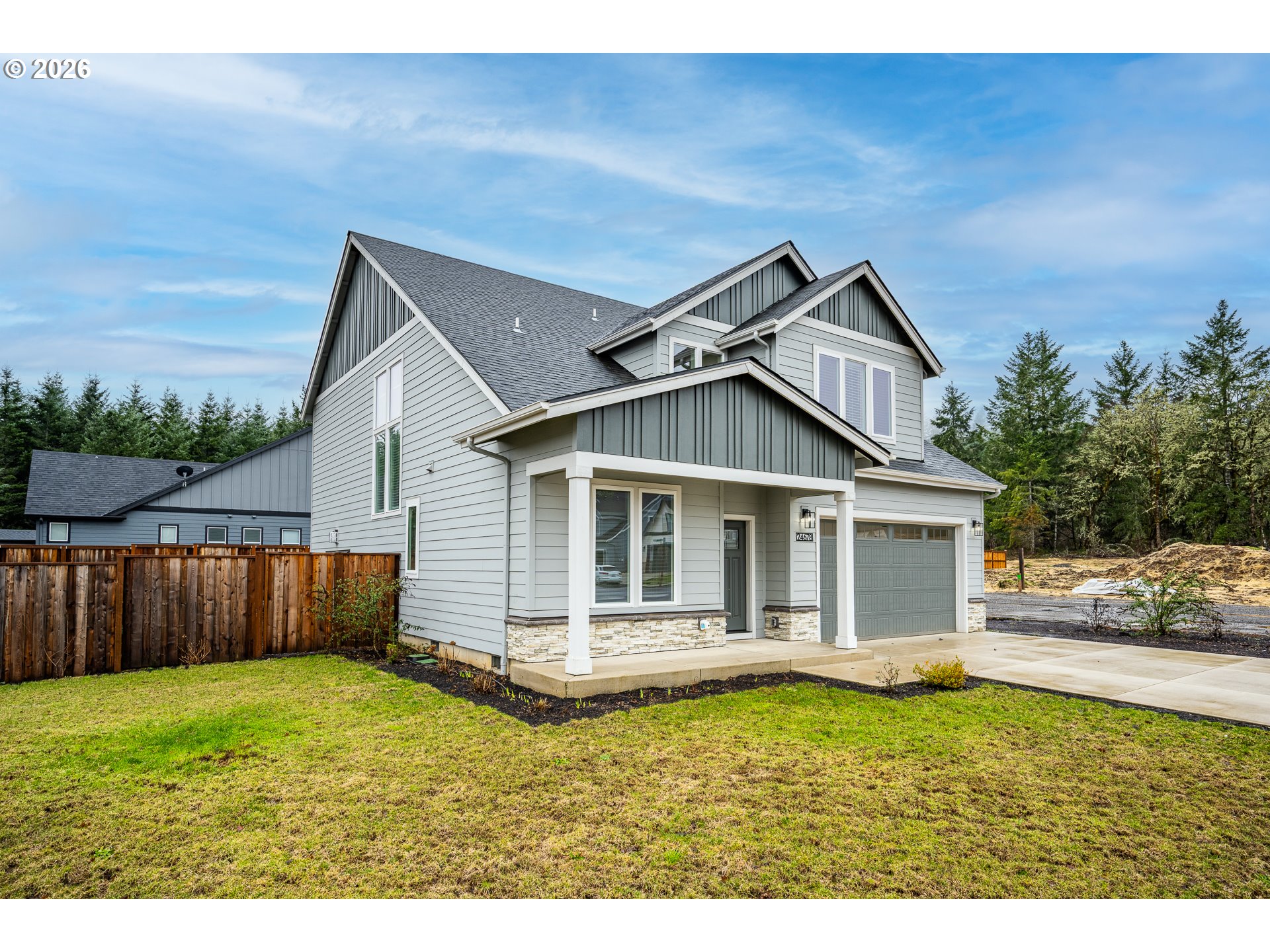 24678 Perkins Road, Unit LOT 26 Veneta, OR 97487 - Photo 42 of 48 a front view of a house with garden