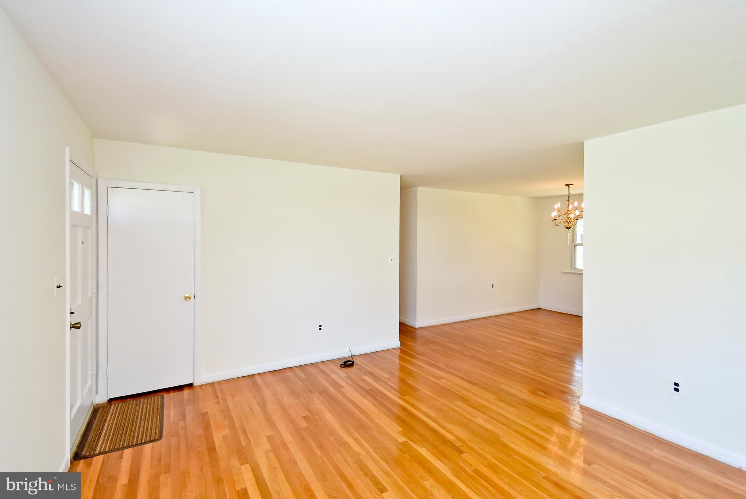 6113 Wheatland Road Baltimore, MD 21228 - Photo 7 of 30 Living Room w/Original Harwoods