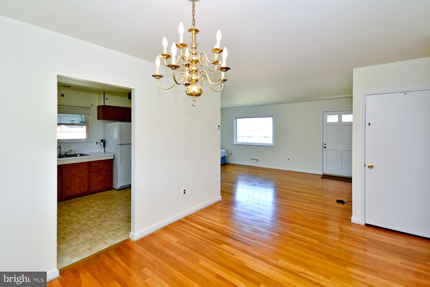 6113 Wheatland Road Baltimore, MD 21228 - Photo 9 of 30 Dining Room view into Living Room