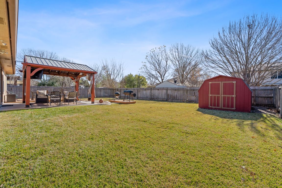 1203 Crossvine Way Pflugerville, TX 78660 - Photo 18 of 22 a view of swimming pool with a yard