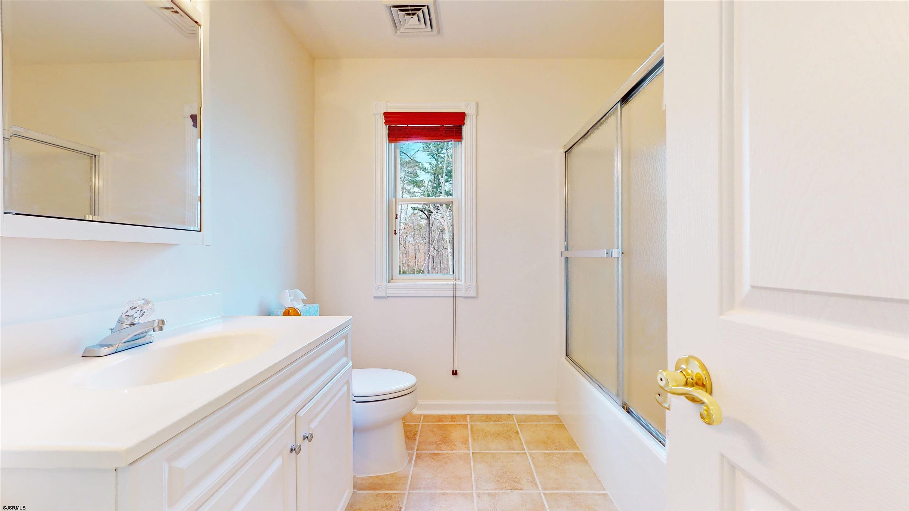 33 North New York Road Smithville, NJ 08205 - Photo 39 of 53 a bathroom with a sink toilet and shower