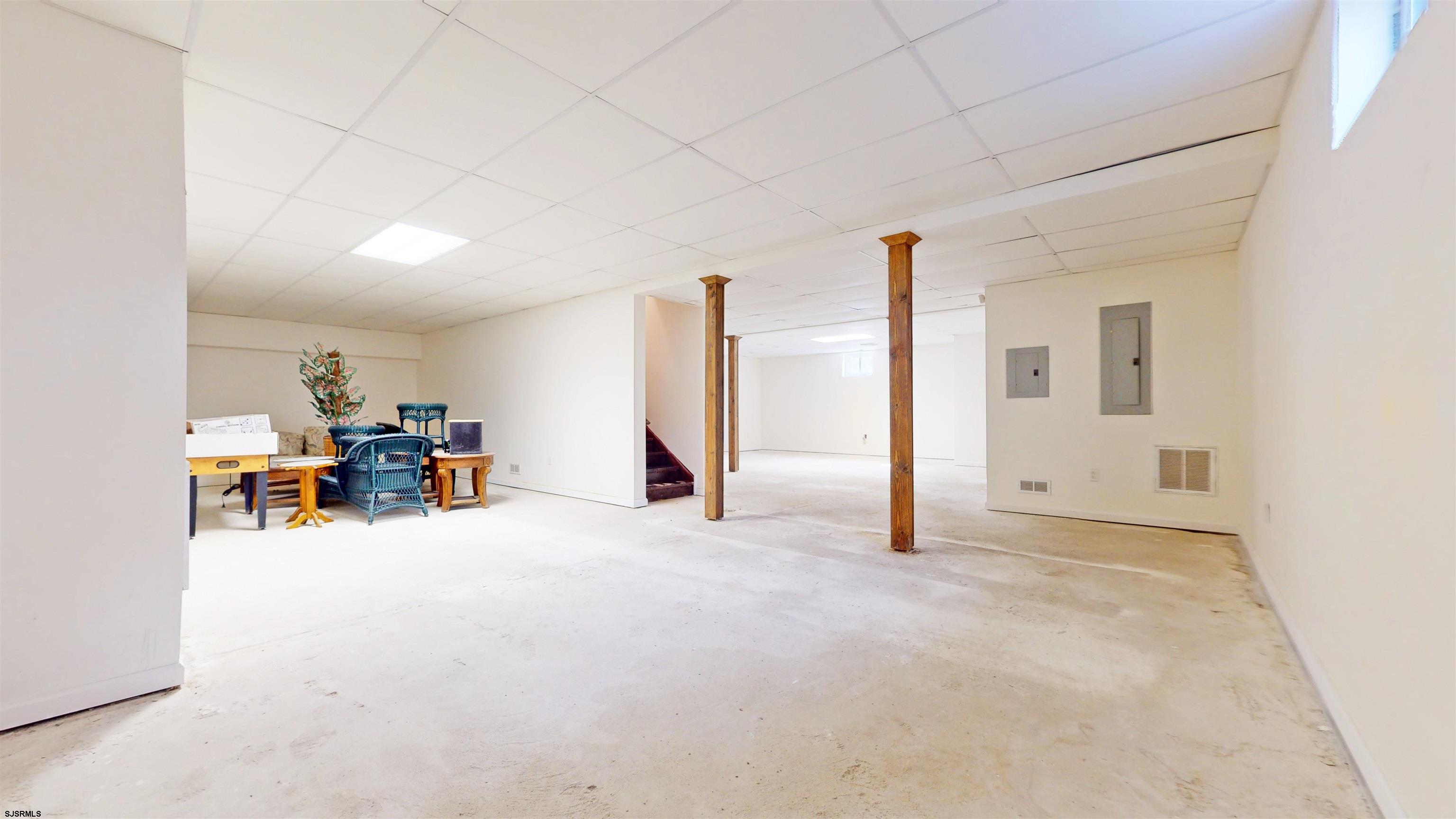33 North New York Road Smithville, NJ 08205 - Photo 43 of 53 an empty room with furniture and a window