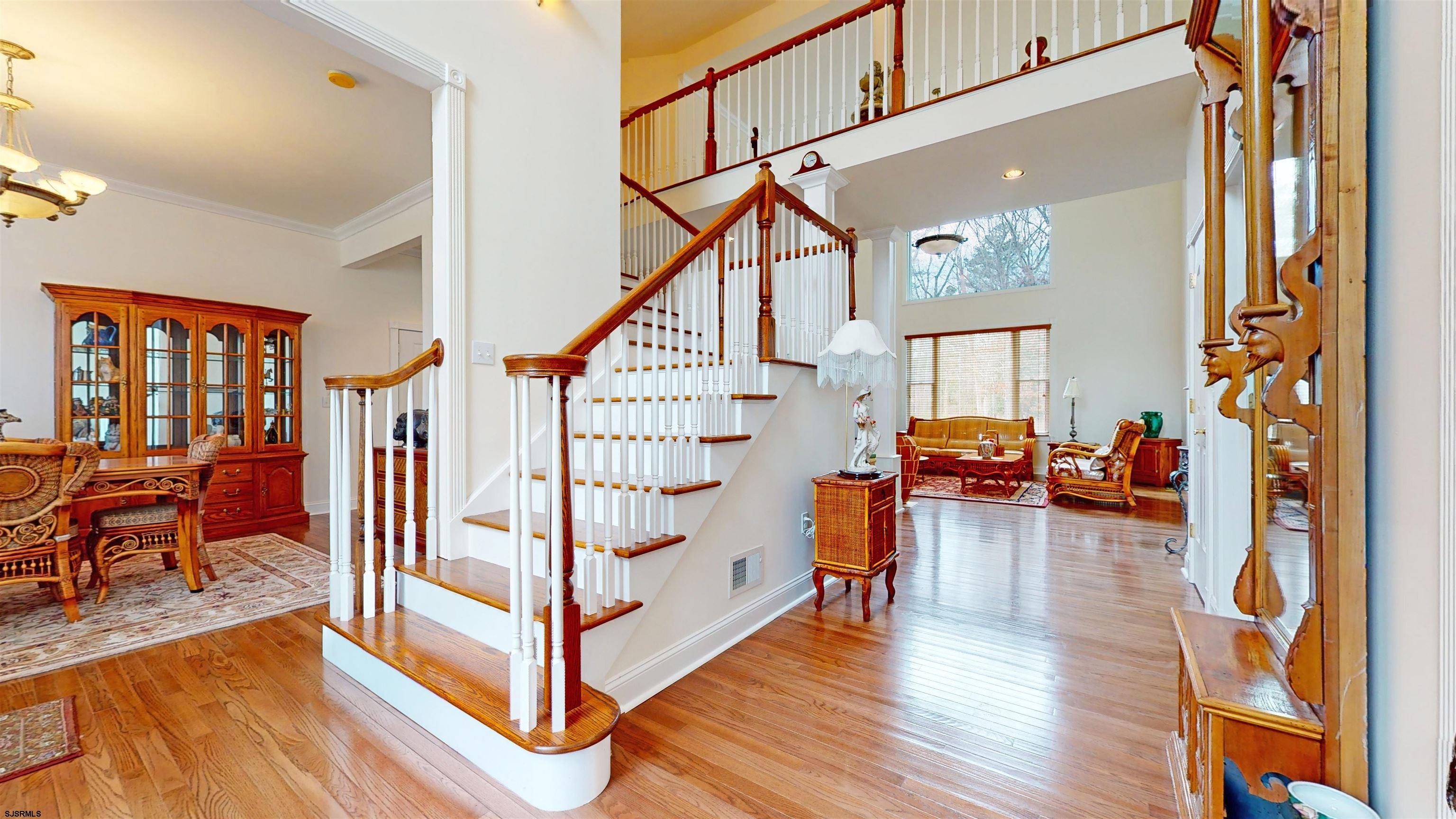 33 North New York Road Smithville, NJ 08205 - Photo 10 of 53 a view of entryway livingroom and hall with wooden floor