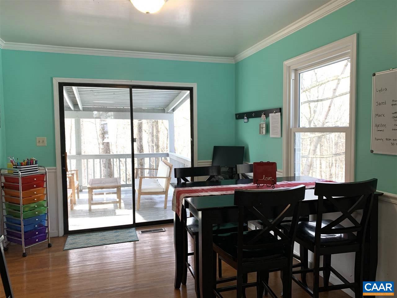 4354 Dickerson Road Charlottesville, VA 22911 - Photo 11 of 29 a dining room with furniture and wooden floor