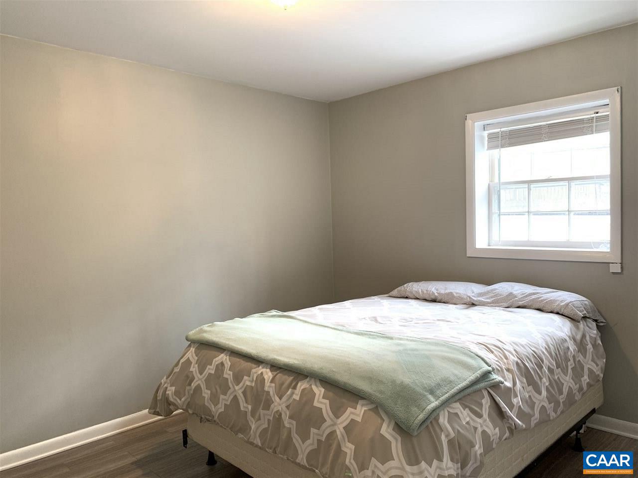 4354 Dickerson Road Charlottesville, VA 22911 - Photo 18 of 29 a bedroom with a bed and a window