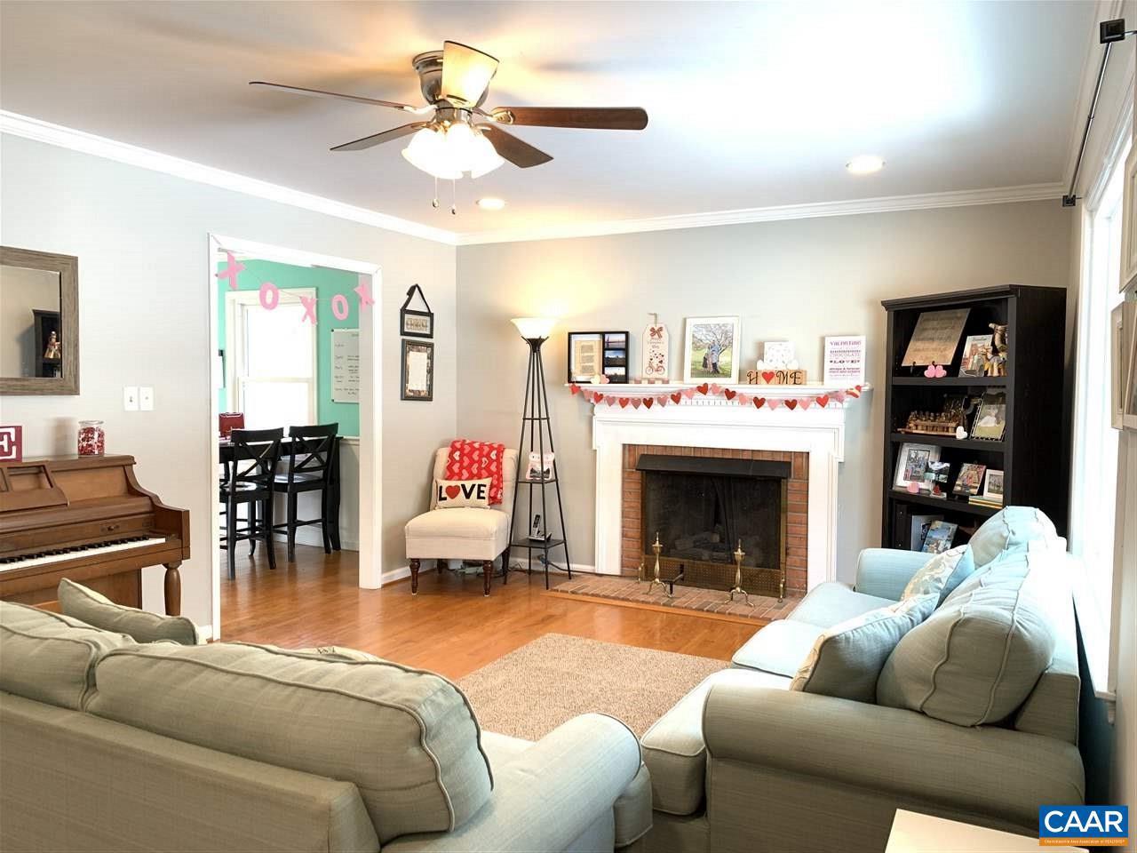 4354 Dickerson Road Charlottesville, VA 22911 - Photo 4 of 29 a living room with furniture and a fireplace