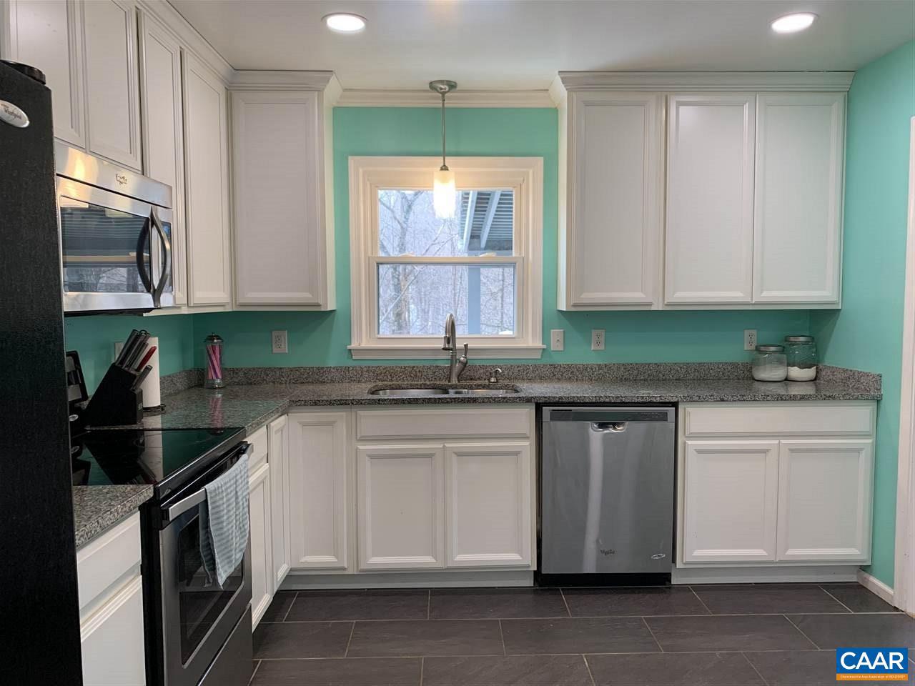 4354 Dickerson Road Charlottesville, VA 22911 - Photo 10 of 29 a kitchen with stainless steel appliances granite countertop a sink and a stove