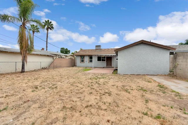 a view of a backyard of a house
