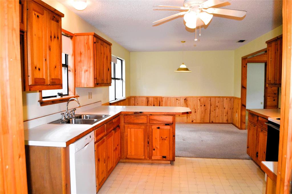213 County Road 1997 Yantis, TX 75497 - Photo 19 of 39 a bathroom with a sink double vanity and a mirror