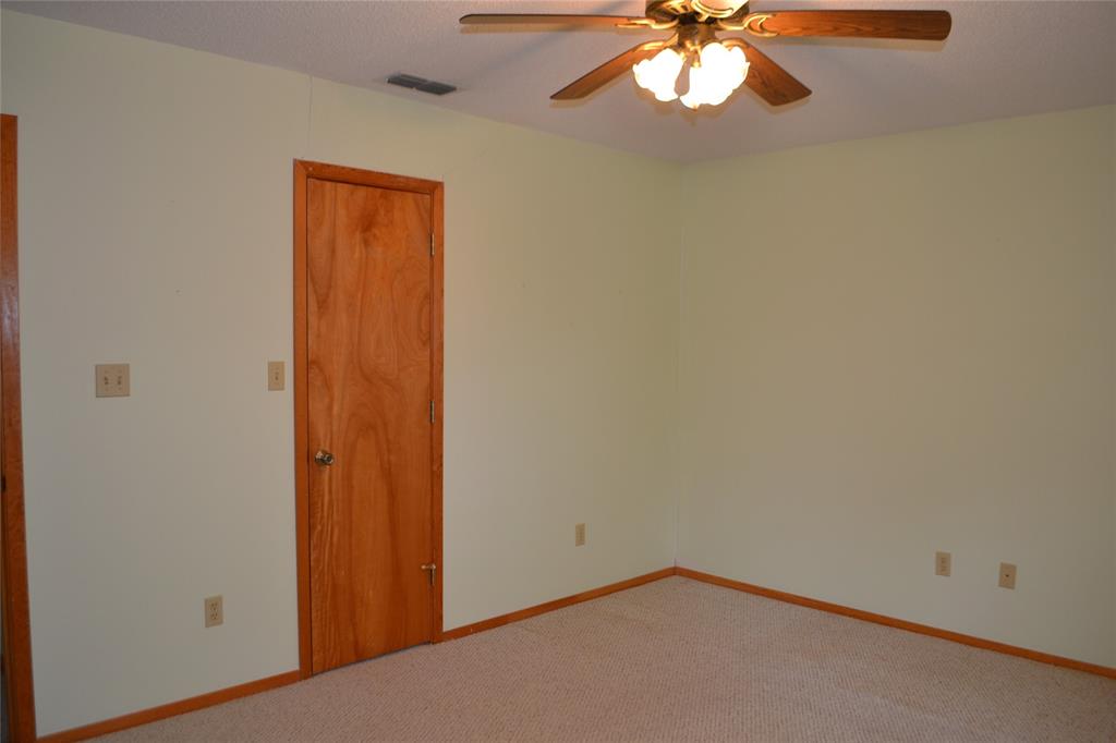 213 County Road 1997 Yantis, TX 75497 - Photo 31 of 39 an empty room with a window