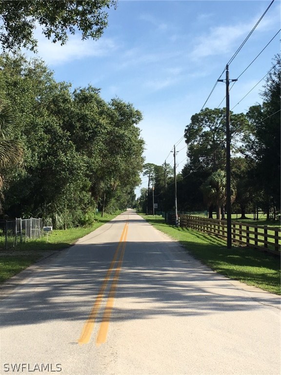 3320 Packinghouse Road Alva, FL 33920 - Photo 9 of 12 a view of a house with a yard
