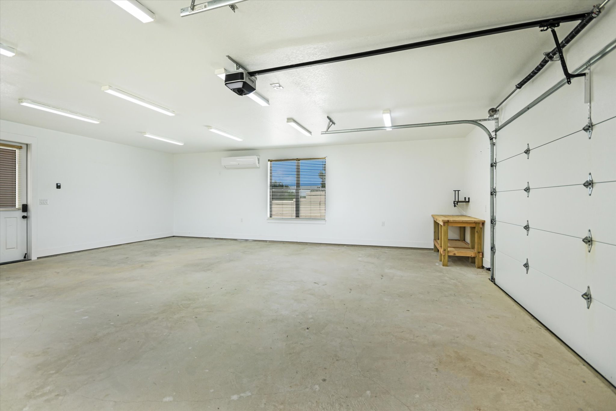 228 Puzzle Pass Spring Branch, TX 78070 - Photo 33 of 35 30' x 30' workshop with mini-split HVAC, electric garage door, and adjacent 50-amp RV hookup.